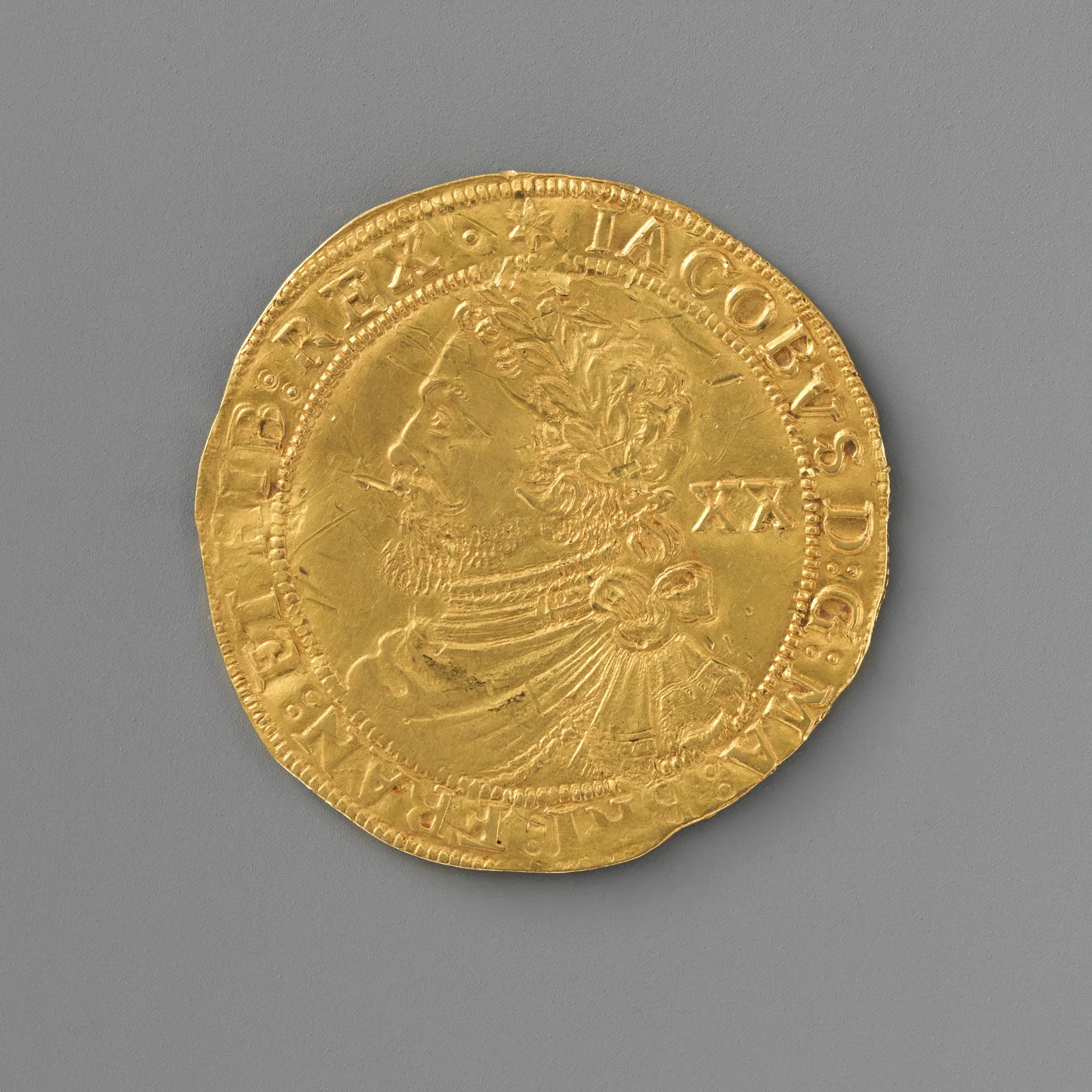Английская золотая монета «лорел» Якова I 1619–1625 годов с портретом короля в лавровом венке